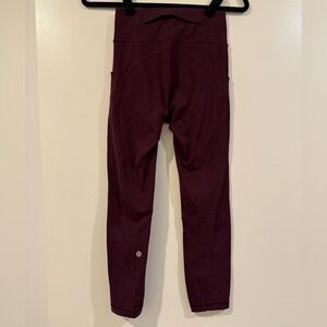 Dark red Lululemon pocketed leggings sz 4